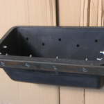 AD400 bucket with metal wearband for abrasive mining application
