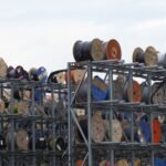 Industrial cable reels stacked outdoors