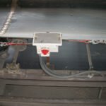 Pullswitch close up view on open conveyor
