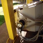 Whirligig shaft sensor mount on conveyor